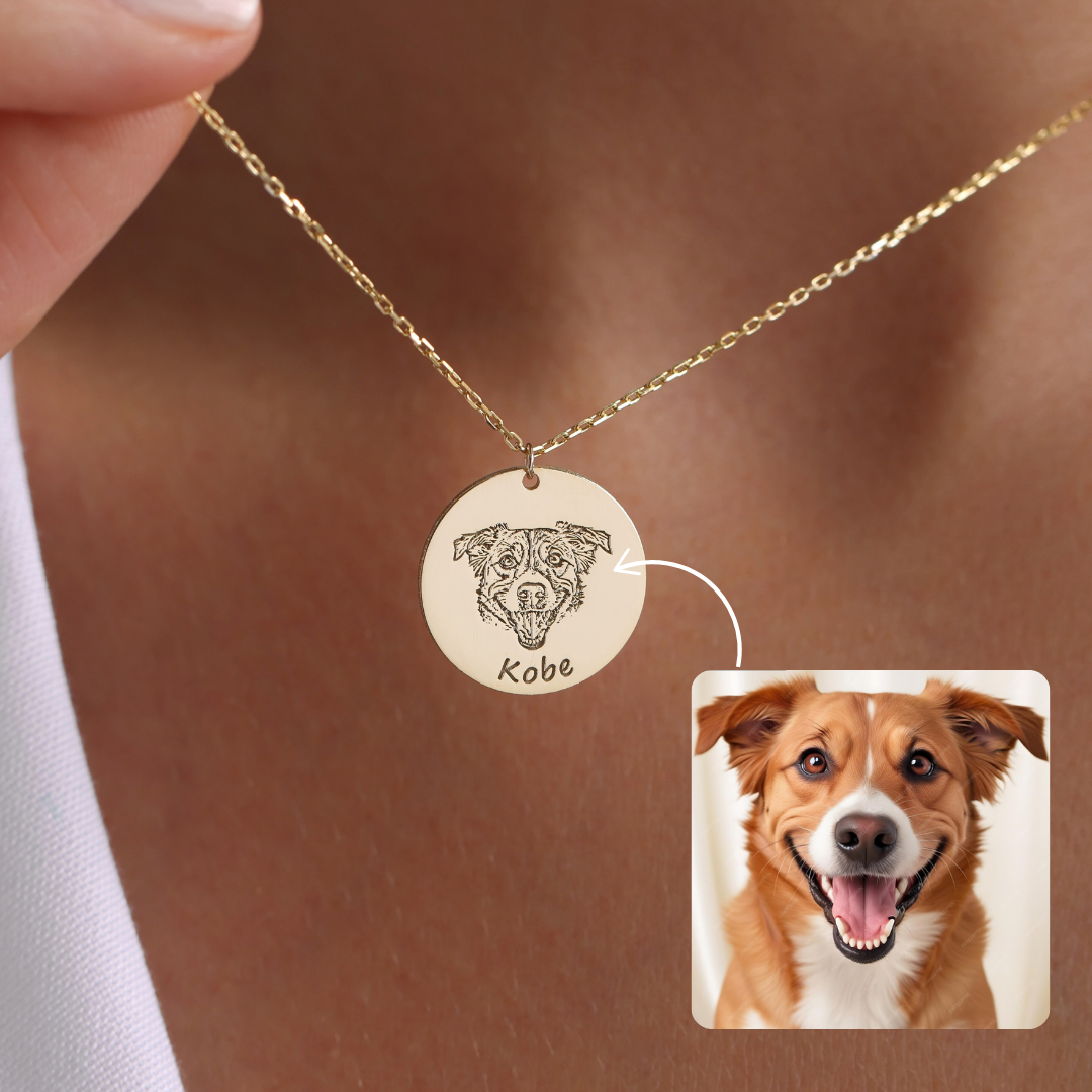 Custom pet portrait necklace engraved with Kobe’s face and name, shown beside the dog photograph