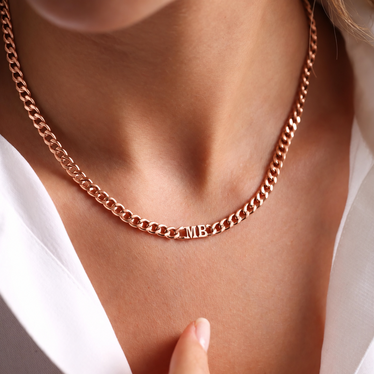 14K rose gold filled curb-chain choker necklace with MB initials, worn close-up