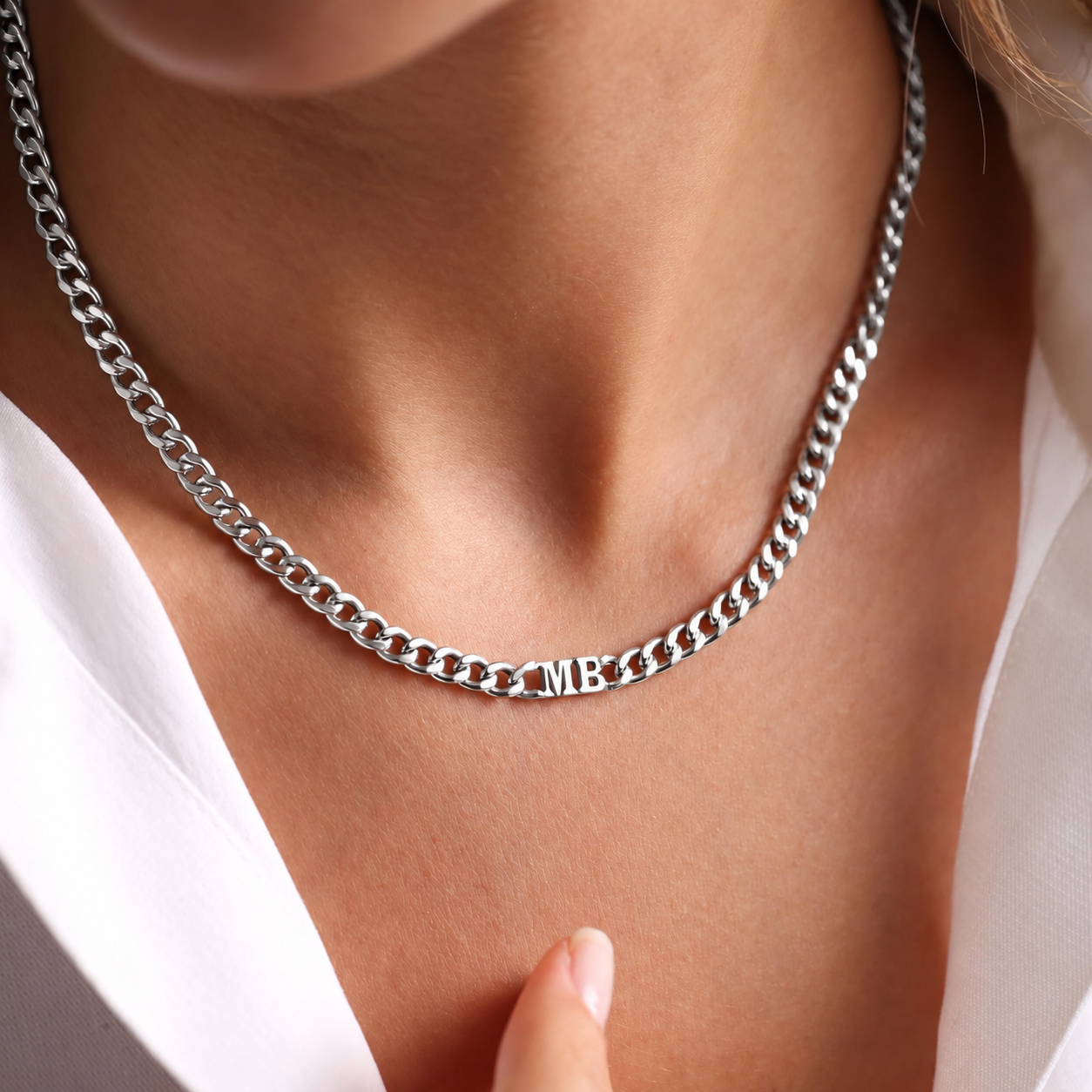 14K solid white gold curb-chain choker necklace with MB initials, worn close-up